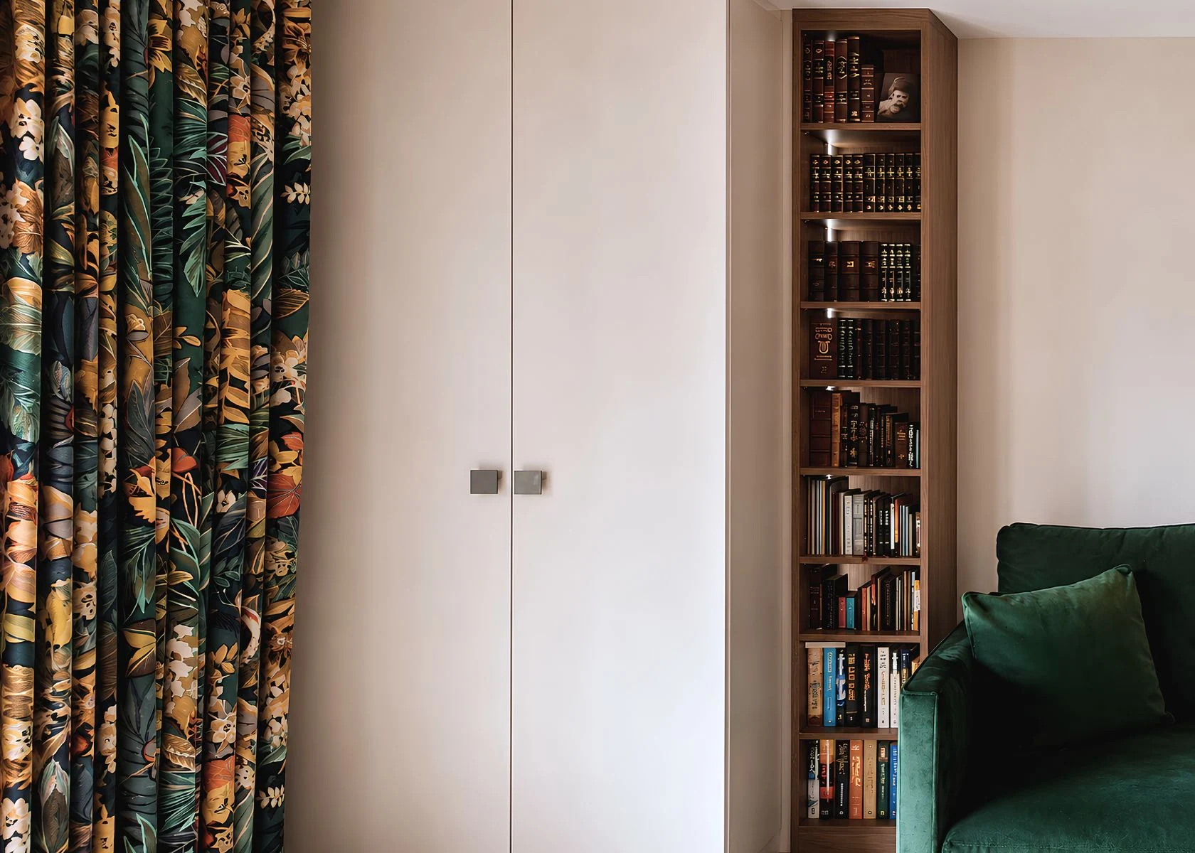 Tufnell Park: Full-height cupboards and open bookshelves.